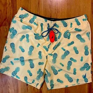 Men’s Nautica swim trunks yellow with green pineapple print. Size XL